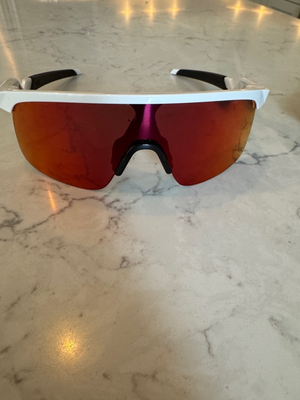 Oakley White Frame Sunglasses with Red-Orange Mirrored Lens